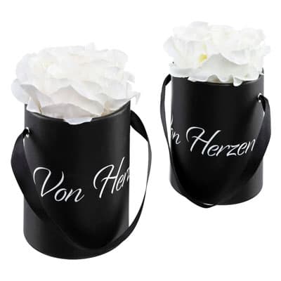 Schwarzer automatischer Lockenstab mit roségoldenen Akzenten auf weißem Hintergrund.