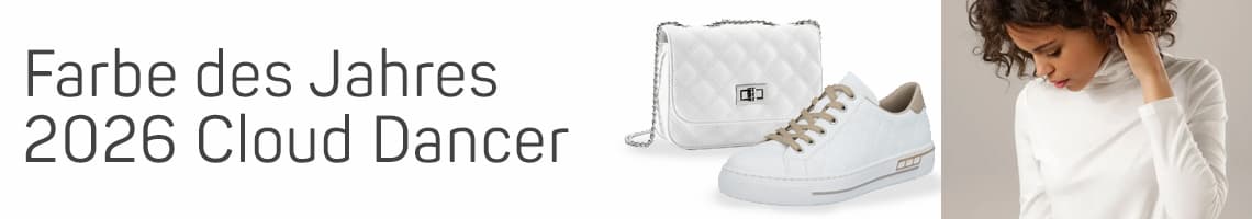 Farbe des Jahres 2026 Cloud Dancer – Weiße Tasche, Sneaker und Person in weißem Oberteil