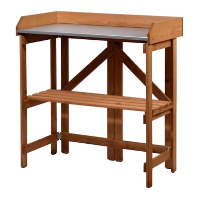 Schlichter Pflanztisch mit hoher Rückwand, Arbeitsfläche und offener Ablage unten