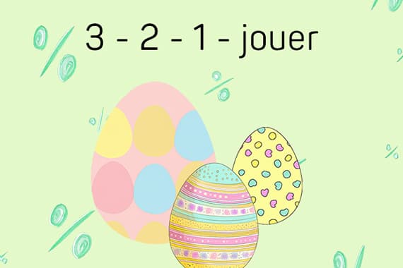 3-2-1 jouer – Trois œufs de Pâques colorés sur fond vert avec signes de pourcentage