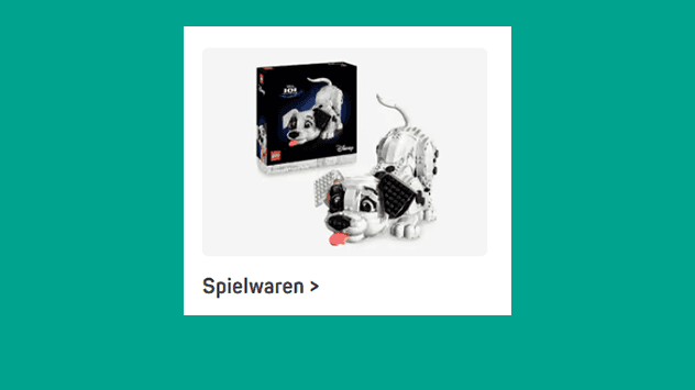 Spielwaren – LEGO Set mit Dalmatiner-Hund als Spielfigur und passender Verpackung im Hintergrund